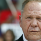 Moore in at an August 2016 news conference. Photo via AP